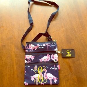 N Gil “E” Monogramed flamingo bag